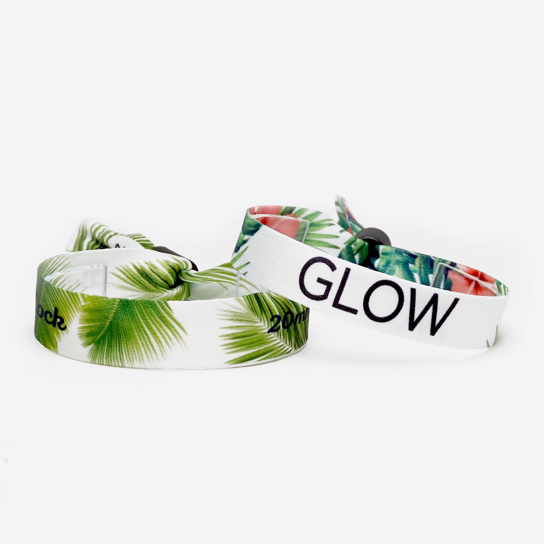 Two full color cloth wristbands with green leafy prints and barrel locks.