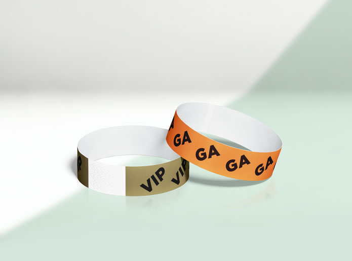 our event access pre printed paper writbands on a mint green background