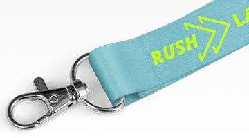 a rush custom lanyard in blue with rushlogo printed on it 