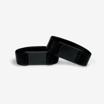 Black elastic RFID wristbands with integrated rectangular RFID chips, shown stacked on a white background for access control and event entry.