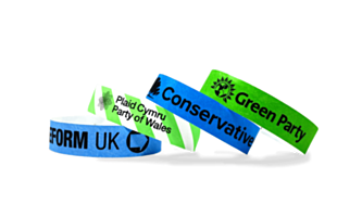 Stack of different general Election Tyvek Wristbands 