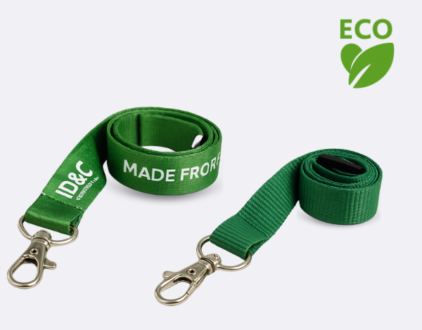 Green eco-friendly lanyards made from recycled PET material with &ldquo;ID&C&rdquo; branding and metal clips, designed for sustainable and reusable use