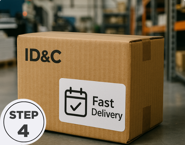 Cardboard shipping box labelled &ldquo;Fast Delivery&rdquo; in a warehouse, symbolising quick and free delivery options for wristband orders