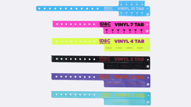 Colourful tabbed wristbands with detachable sections labelled for voucher and ticket use, available in multiple colours for customisable event management